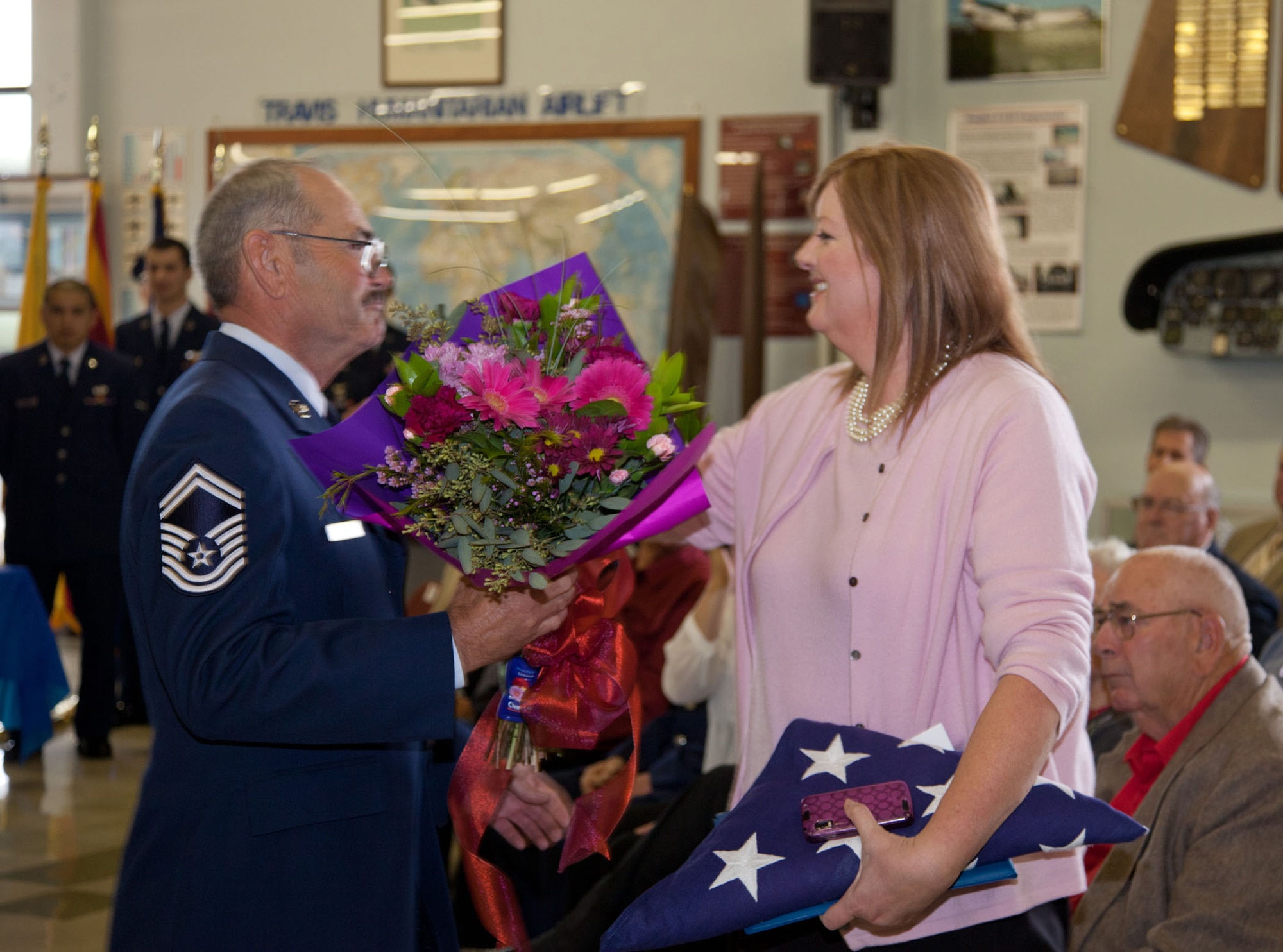 TRAVIS AIR FORCE BASE, Calif. -- Family and friends of Senior Master Sgt. David Raymond celebrate his 40 years of service in the U.S. Air Force Reserve at a retirement ceremony at Travis Air Force Base, Calif., April 11, 2012. Maj. Gen. Frank J. Padilla, Deputy Inspector General of the Air Force, presided over the ceremony honoring Raymond’s legacy as a C-5 Galaxy flight engineer with the 312th Airlift Squadron, 349th Air Mobility Wing.  Raymond began his military career as a C-141 loadmaster at Travis AFB during the Vietnam War. (U.S. Air Force photo / Lt. Col. Robert Couse-Baker)
