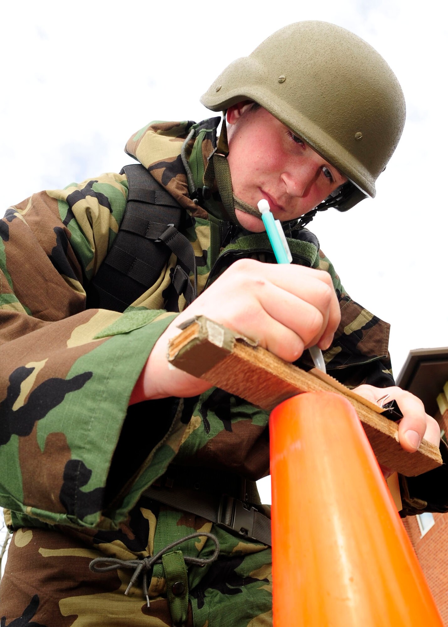 RAF MILDENHALL, England – Airman 1st Class Zachery Goulding, 352nd Special Operations Maintenance Squadron labels M8 paper during a Chemical, Biological, Radiological and Nuclear training class here April 12, 2012. M8 paper is used to detect chemicals in the air when there is a chance of a CBRN threat. (U.S. Air Force photo/Senior Airman Ethan Morgan)