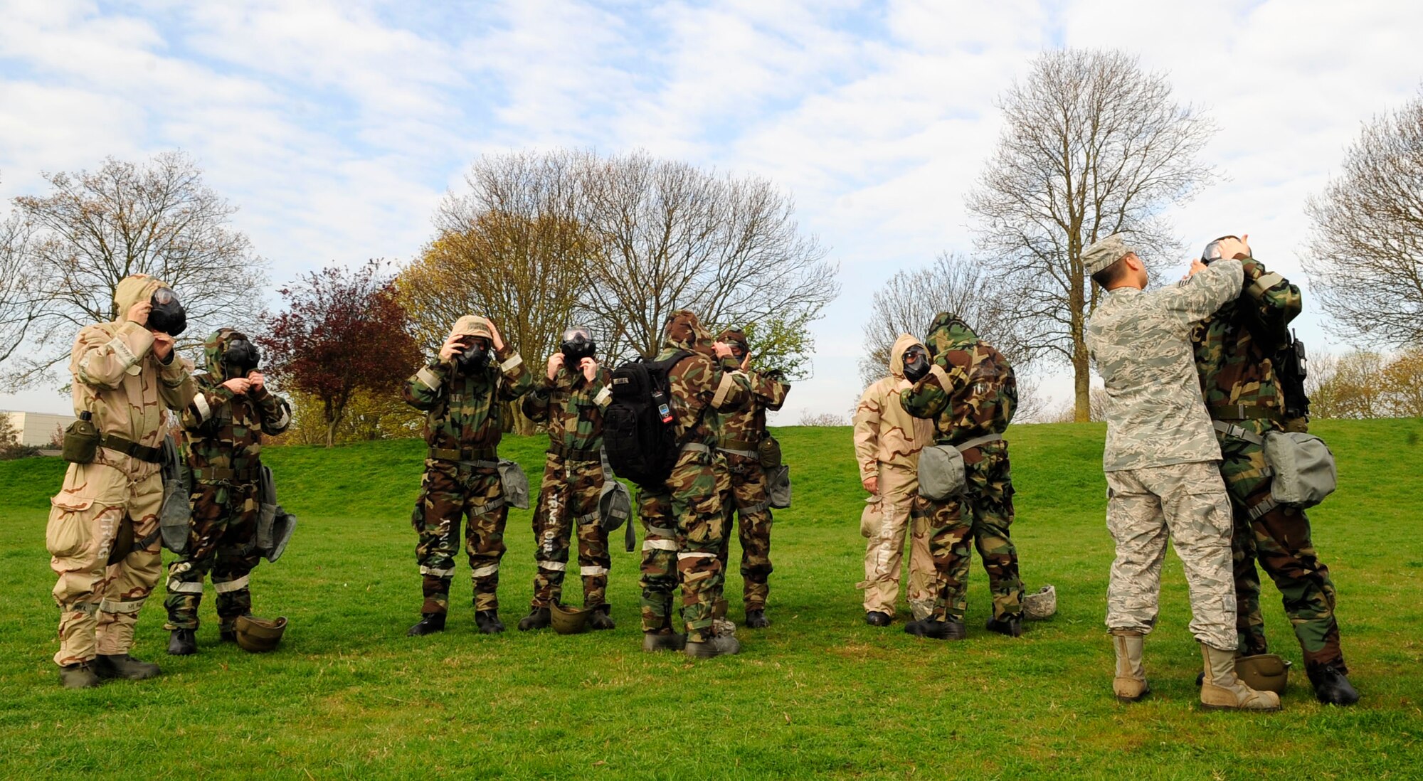 RAF MILDENHALL, England - Airmen from various squadrons on base suit up during a Chemical, Biological, Radiological and Nuclear training class here April 12, 2012. The training teaches basic concepts and procedures vital to ensure safety of personnel and assets in the event of a CBRN threat. (U.S. Air Force photo/Senior Airman Ethan Morgan)
