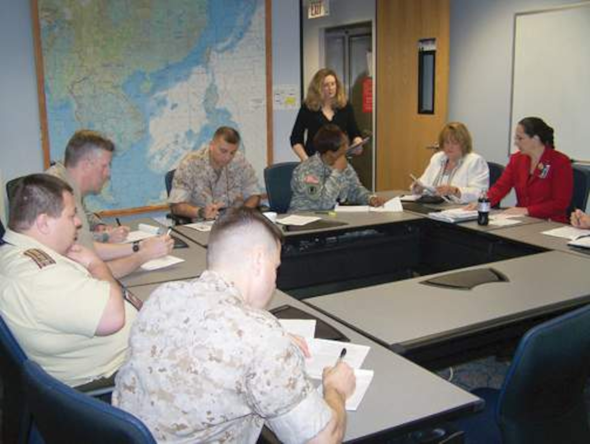 Students from multiple senior service schools conduct planning during execution of the 2011 Joint Land, Air and Sea Strategic Exercise. More than 120 students from these schools arrive Sunday to begin the 2012 event. (Air Force photo by Tech. Sgt. Juan Torres)