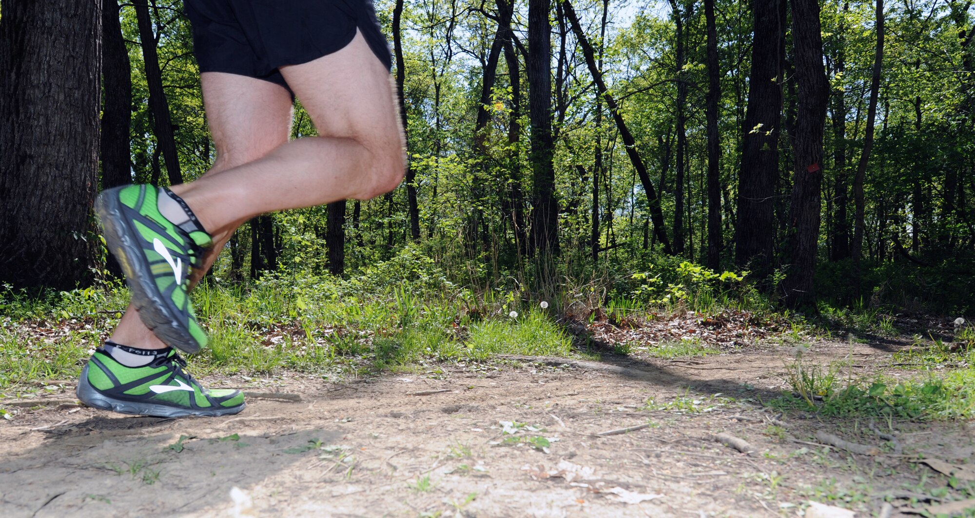 Craig Burton, 442nd Fighter Wing Command Post, runs on a trail in Knob Noster State Park. Through running and bicycling, Burton has lost close to 50 pounds in his efforts to be fit-to-fight. The 442nd FW is an A-10 Thunderbolt II Air Force Reserve unit at Whiteman Air Force Base, Mo.