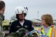 A member from LifeNet Air Medical Services assists a role-player posing as a victim during a major accident response exercise (MARE) at Rosecrans Memorial Airport, St. Joseph, Mo., April 12, 2012. The MARE tested Air National Guard and civilian agencies in their ability to respond to an aircraft accident. (U.S. Air Force photo by Staff Sgt. Michael Crane/Missouri Air National Guard)