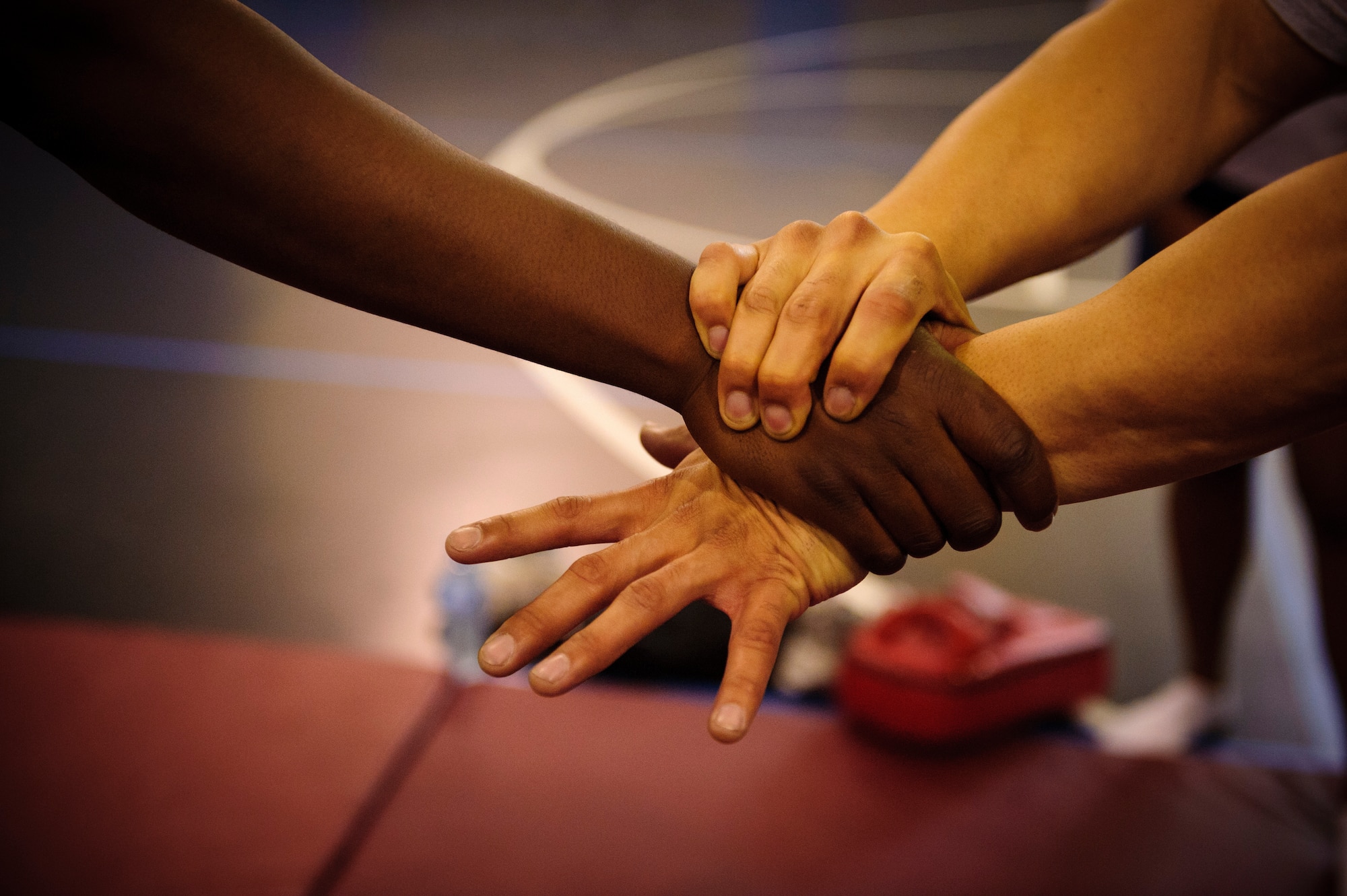 SOUTHWEST ASIA – Tech. Sgt. Ivan Abudo, 379th Expeditionary Communications Squadron, demonstrates how to break free of a perpetrator’s grasp during a self defense class here April 12, 2012. April is Sexual Assault Awareness Month, which educates people on ways to report sexual assault, as well as resources available for victims and their families. (U.S. Air Force photo/Staff Sgt. Nathanael Callon) 