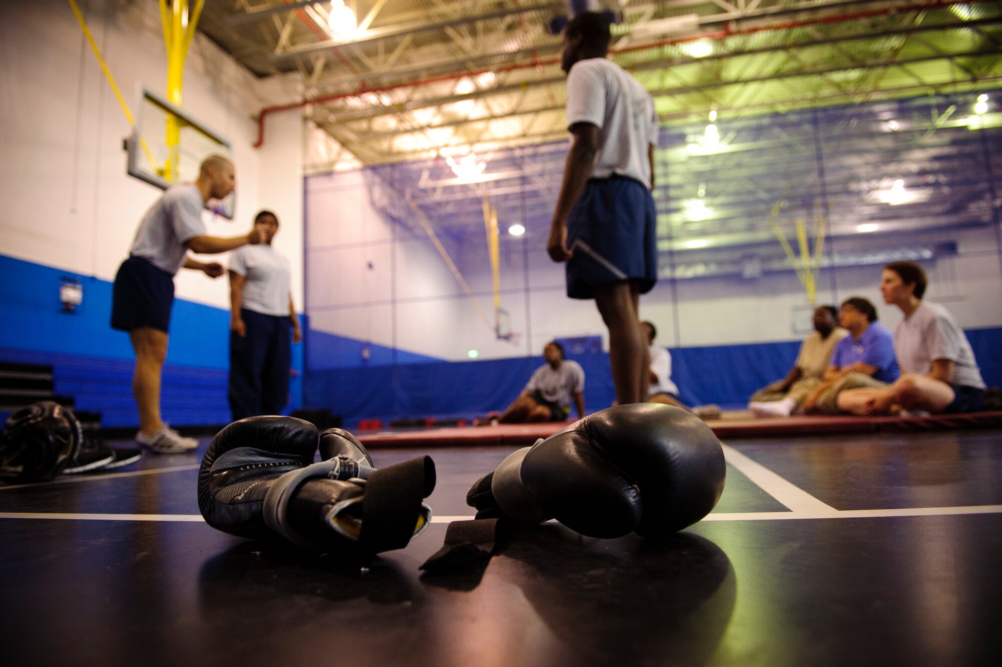 SOUTHWEST ASIA – Tech. Sgt. Ivan Abudo, 379th Expeditionary Communications Squadron, teaches a self defense class to attendees here April 12, 2012. The self defense class was held as a part of Sexual Assault Awareness Month. (U.S. Air Force photo/Staff Sgt. Nathanael Callon)