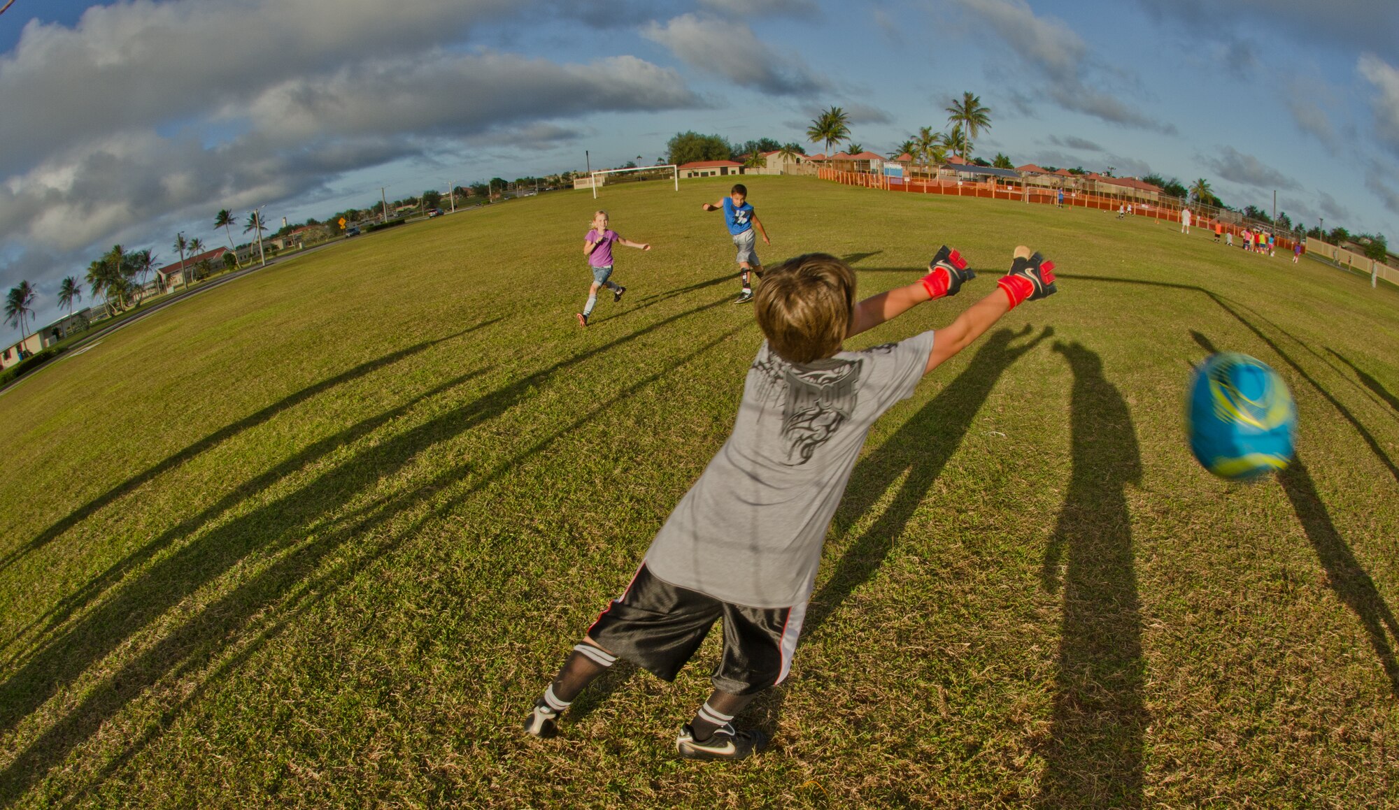 Team Andersen’s “Lil’ Bombers” engage in their weekly soccer practice on base April 3.  The “Lil’ Bombers” club is part of the Guam Football Association downtown, and any Andersen youth soccer stars who may be interested in not just playing soccer, but getting involved in the community, are encouraged to participate.  For information on the “Lil’ Bombers,” e-mail lilbombersoccerclub@hotmail.com.  (U.S. Air Force photo by Staff Sgt. Alexandre Montes)