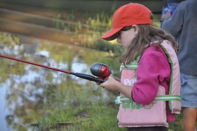 CALHOUN FALLS, S.C. — A child casts her rod in hopes to land a catfish at the 2011 Kid's Fishing Derby hosted by the Army Corps of Engineers at Lake Richard B. Russell.