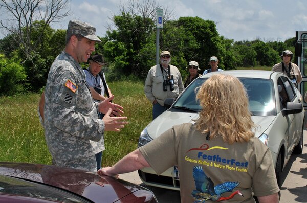 GALVESTON, Texas — Col. Christopher Sallese, U.S. Army Corps of Engineers Galveston District commander, welcomes birders to the Corps Woods on the first day of FeatherFest 2012. The Corps Woods, part of the beneficial use site developed using dredged materials, has become a pristine habitat for wildlife and a favorite destination for both migratory birds and birders. 