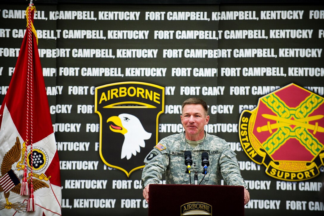 Army Maj. Gen. James C. McConville introduces Army Chief of Staff Gen. Raymond T. Odierno, not shown, at a town hall meeting with soldiers and family members on Fort 
Campbell, Ky., April 12, 2012. McConville is the commanding general of the 101st Airborne Division.