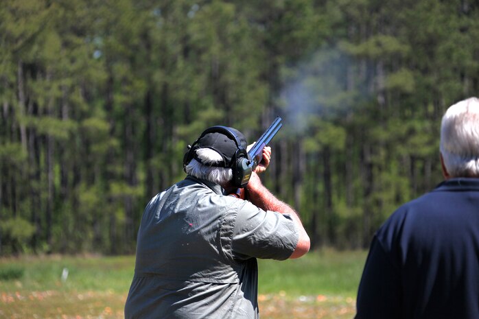 Jerry Weaver fires at a clay pigeon during a Marine Corps Air Station Cherry Point Skeet Club Spring Family Fun Shoot at the air station shotgun range April 14. Weaver was the winner of the tournament with a final score of 44 targets out of 50, topping 38 other competitors.