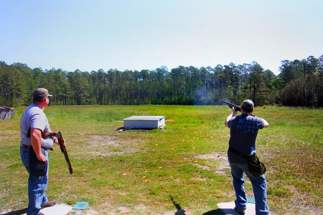 AARON CALDWELL FIRES AT A CLAY PIGEON DURING A MARINE CORPS AIR STATION CHERRY POINT SKEET CLUB SPRING FAMILY FUN SHOOT AT THE AIR STATION SHOTGUN RANGE APRIL 14.