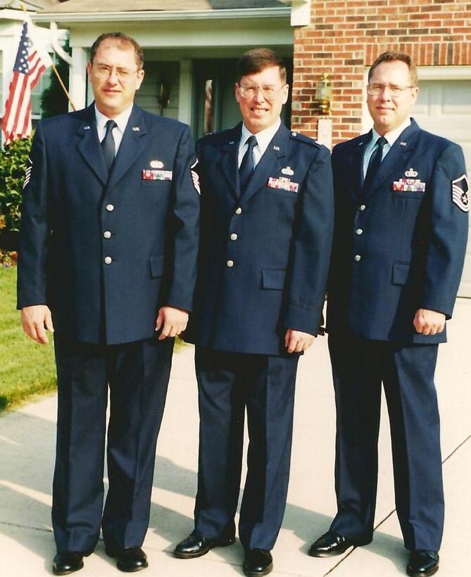 Chief Master Sgt. Dan Asher (then master sergeant) poses with his brothers who also have made the Air Force their career.  Asher retires from the 932nd Airlift Wing this month, capping a 30-year career in the Air Force.  (Courtesy photo)