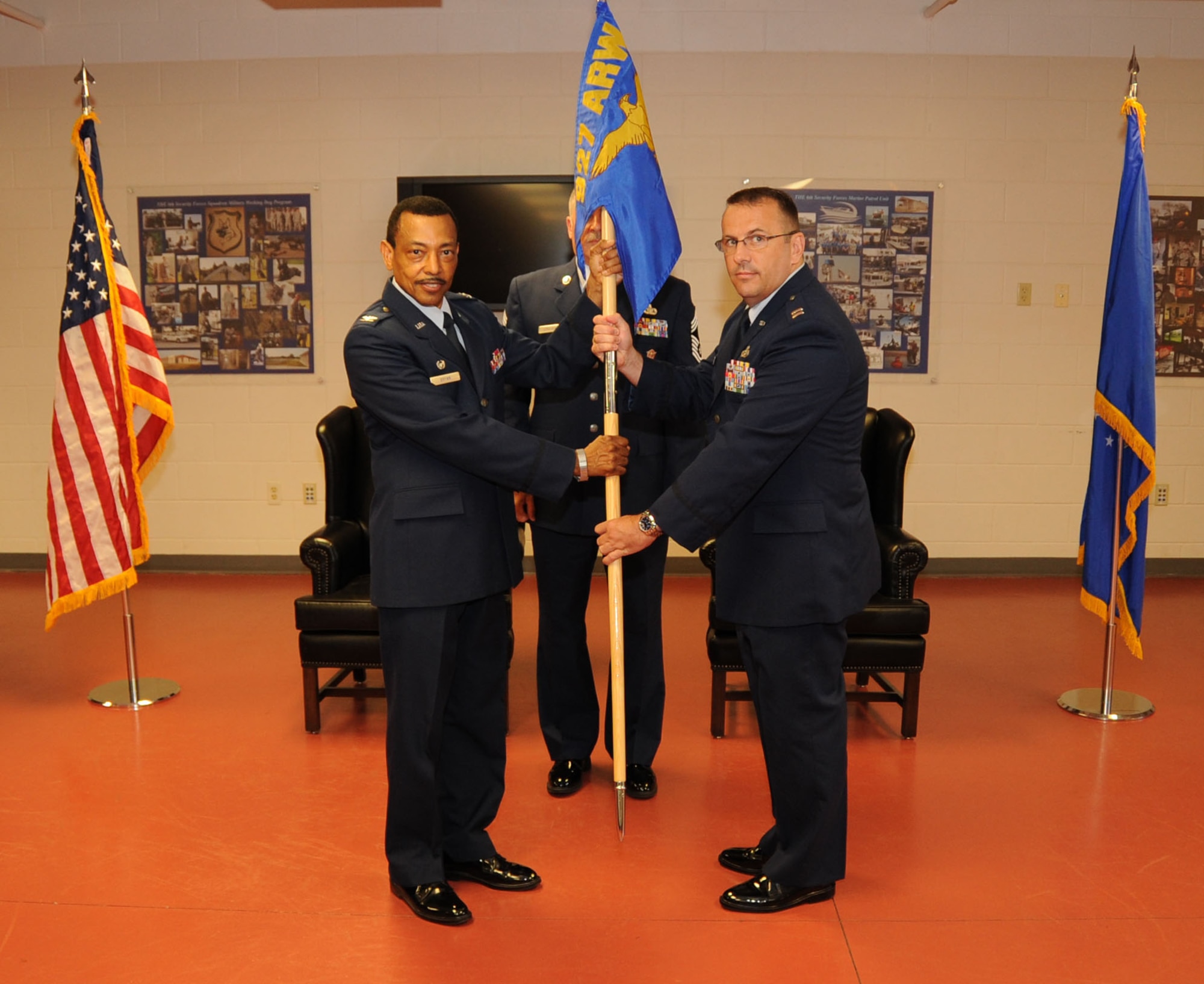 MACDILL AIR FORCE BASE, Fla. -- Colonel Rodney Bryan, commander of the 927th Mission Support Group, turned over the reigns of the 927th Security Forces Squadron to Captain William Beauchene during an assumption of command ceremony here April 14.  (Official U.S. Air Force Photo by Staff Sgt. Shawn Rhodes)