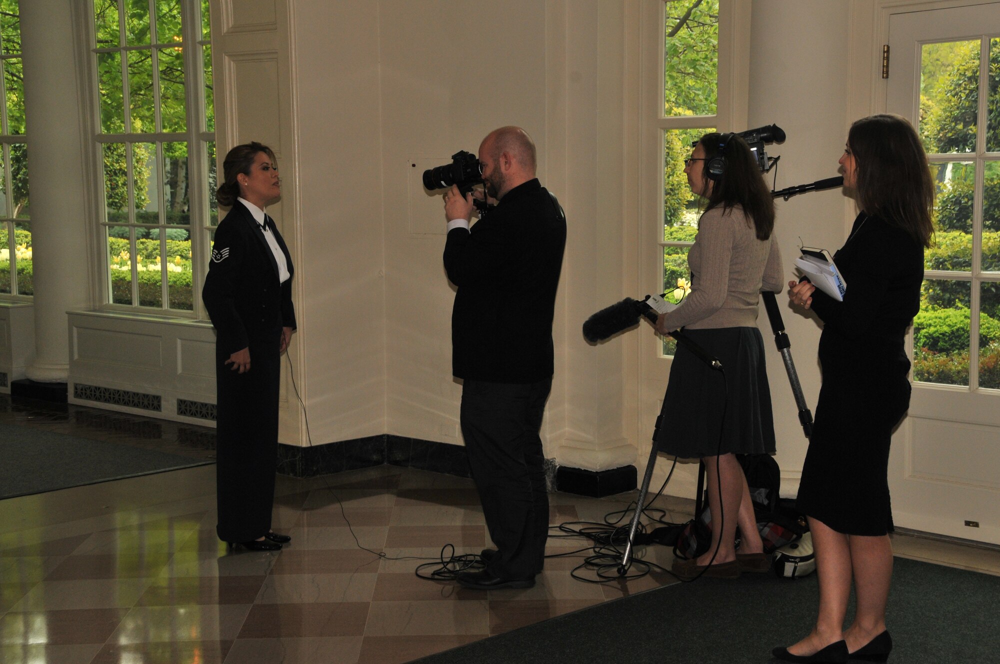 Sidewinder member TSgt Angie Johnson interviews with media after The Joining Forces Initiative Event headed by Michelle Obama and Dr. Jill Biden April 11, 2012 (photo by Senior Master Sgt. Mary-Dale Amison).