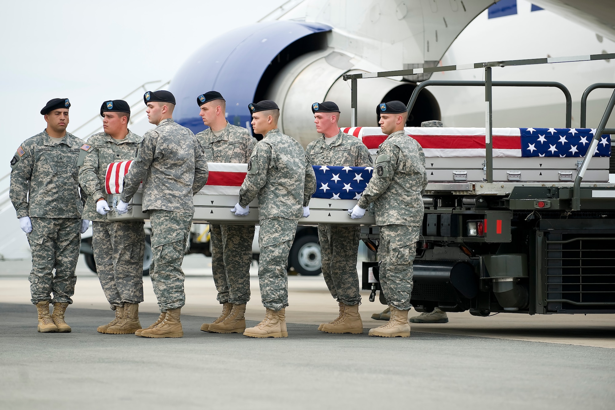 A U.S. Army carry team transfers the remains of Army Spc. Philip C. S. Schiller of The Colony, Texas, at Dover Air Force Base, Del., April 14, 2012. Schiller was assigned to the 1st Battalion, 23rd Infantry Regiment, 3rd Stryker Brigade Combat Team, 2nd Infantry Division, Joint Base Lewis-McChord, Wash. (U.S. Air Force photo/Adrian R. Rowan)