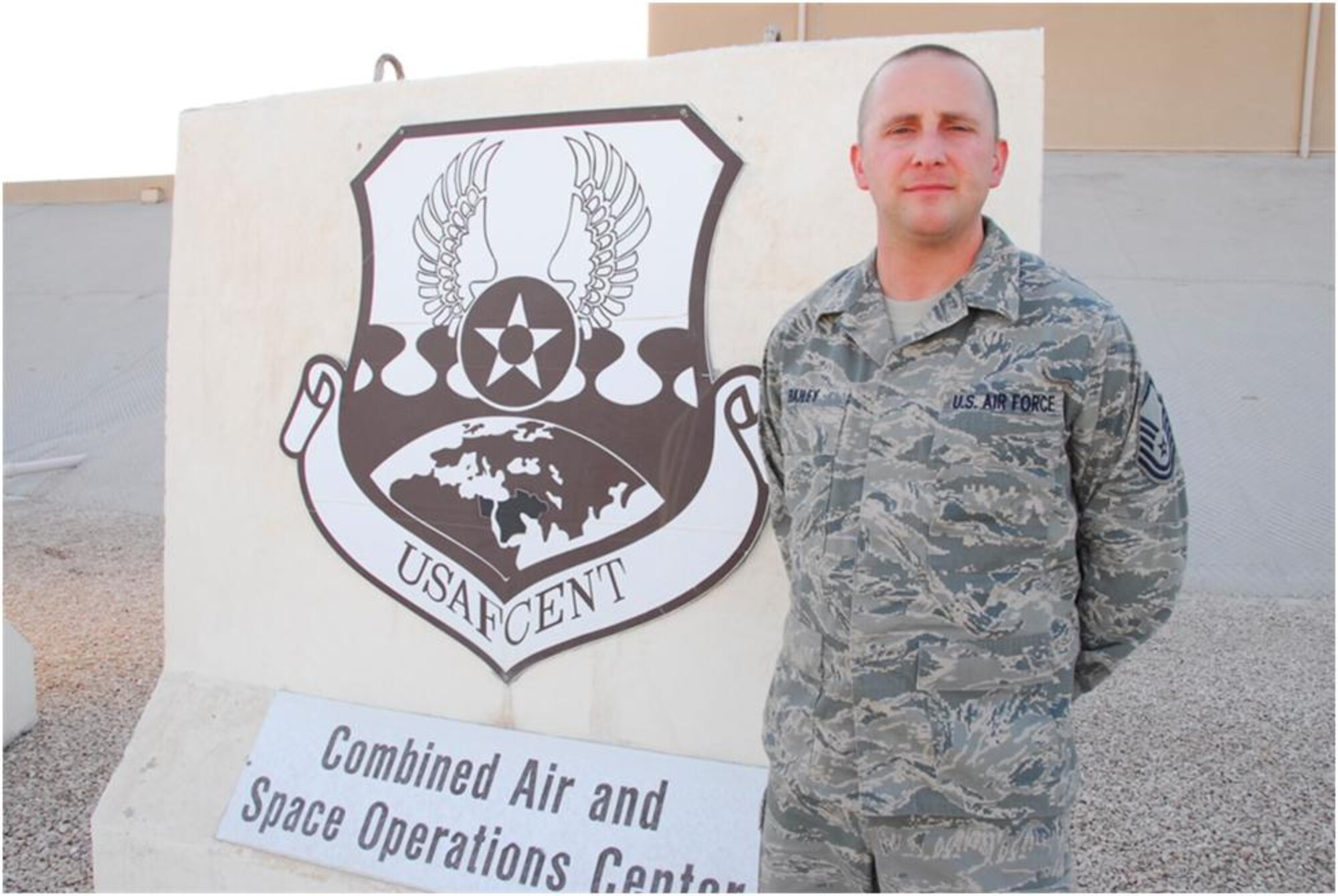 Master Sgt. Robert E. Bailey poses for a picture during a seven-month deployment in 2011 and 2012 to the Combined Air and Space Operations Center in Southwest Asia where he served as the Superintendent of the Targeting and Imagery Support Element. While deployed, Bailey was recognized for his excellence and selected to be the SNCO of the Year for the state of Connecticut. (Photo courtesy of Master Sgt. Robert Bailey) 