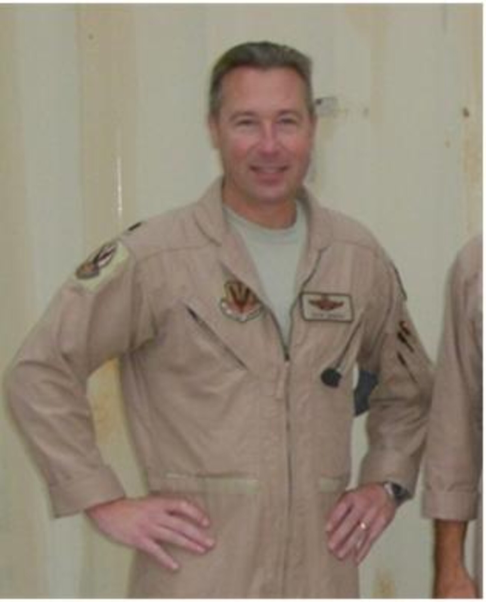 Lt. Col. John M. Girnius poses for a picture while deployed to the Combined Air and Space Operations Center in Southwest Asia, serving as the Chief, Combat Operations, and supervising more than 120 U.S. and Coalition forces. Lt. Col. Girnius’ deployment in March 2012 marks the 100th individual deployment milestone for the 103rd Air Operations  Group, Bradley Air National Guard Base, East Granby, Conn.  (Photo courtesy of Lt. Col. John M. Girnius)
