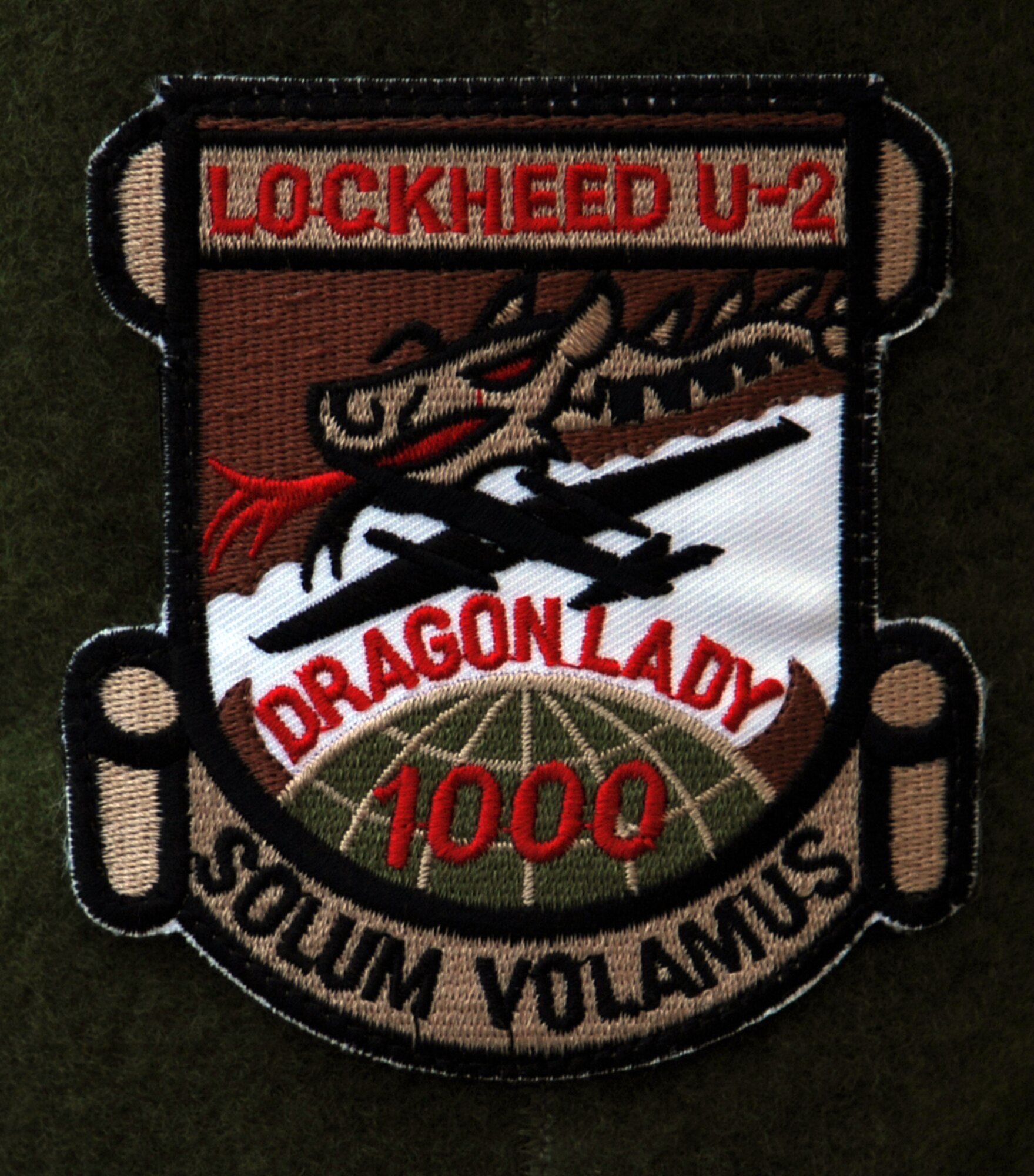 SOUTHWEST ASIA - Lt. Col. Andrew sports a special patch on his flight suit recognizing his achievement of logging his 1,000th flight hour in the U-2 April 14, 2012. Andrew, deployed from Beale Air Force Base, Calif., is the 99th Expeditionary Reconnaissance Squadron commander. The U-2, affectionately referred to as the Dragon Lady, records intelligence, surveillance and reconnaissance data on missions lasting up to 12 hours at a time. For security reasons, U-2 pilots can only be identified by their first names. (U.S. Air Force photo/Staff Sgt. J.G. Buzanowski)