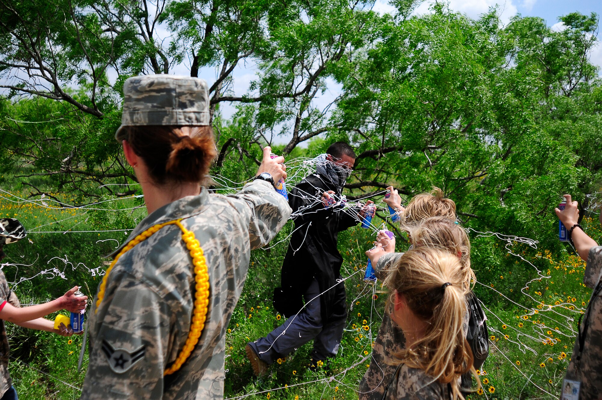GOODFELLOW AIR FORCE BASE, Texas – "U.S. Forces" overtake the "enemy" in support of Operation Kids April 14.  The mock deployment event gives military youth an understanding of the deployment process that their parents go through, using a series of fun and educational activities. (U.S. Air Force photo/Staff Sgt. Austin Knox)