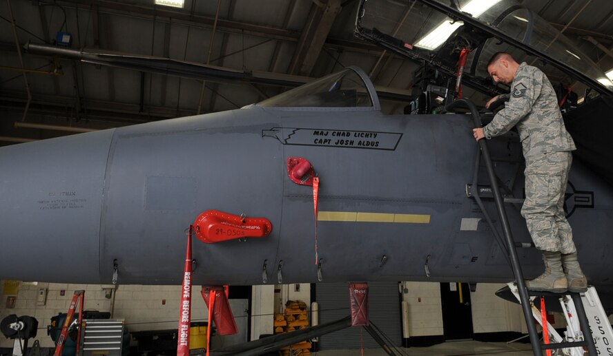 U.S. Air Force Master Sgt. Nelson Ortega performs a final inspection on an F-15E Strike Eagle on Seymour Johnson Air Force Base, N.C., April 13, 2012. Airmen from the 4th Aircraft Maintenance Squadron are prepared aircraft for an April 16 Turkey Shoot. Ortega, 334th Aircraft Maintenance Unit production superintendant, hails from Fayetteville, N.C. (U.S. Air Force photo/Airman 1st Class Aubrey Robinson/Released)