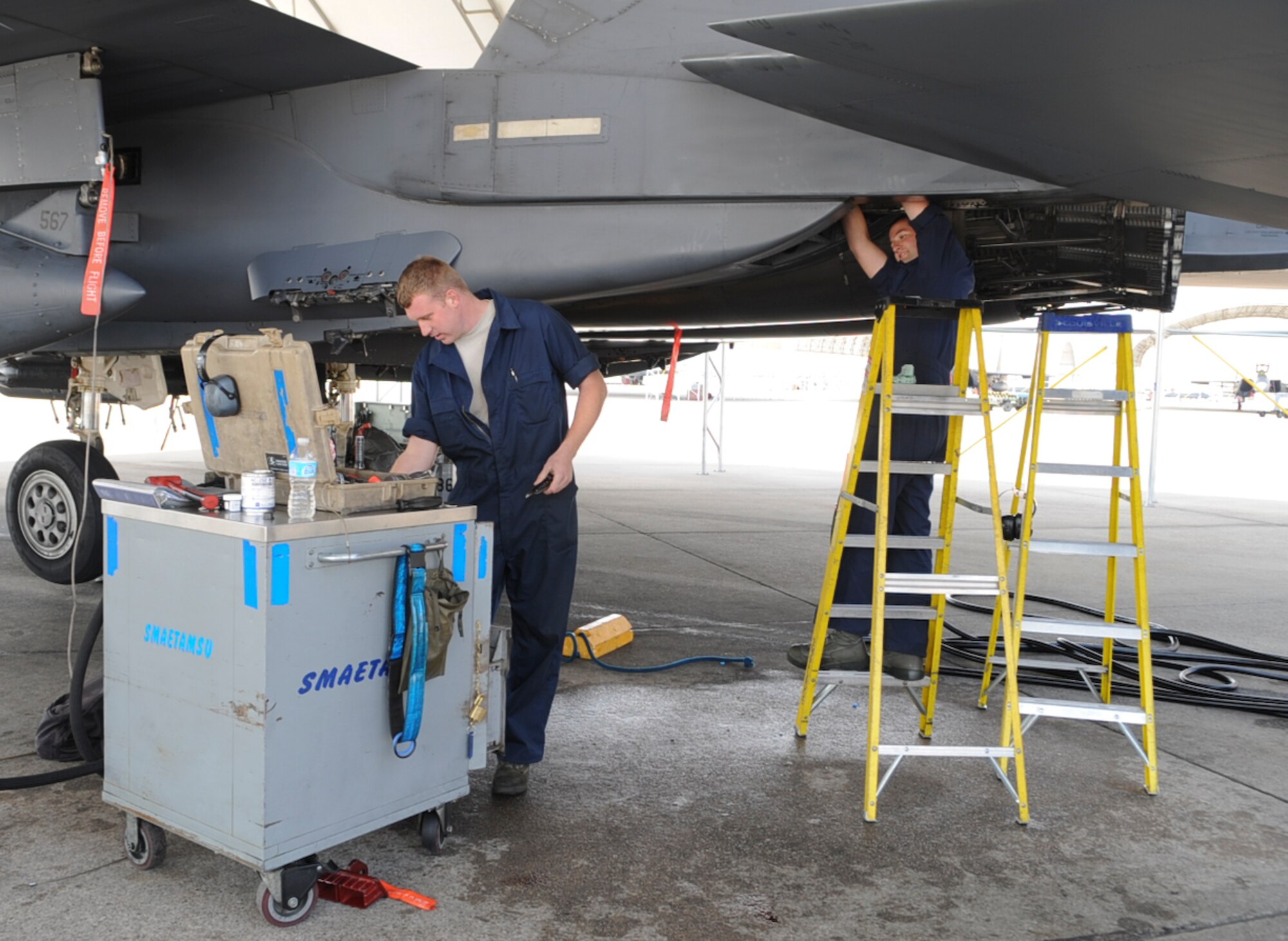 U.S. Air Force Senior Airmen Ryan Smith and Adam Johnson replace an F-15E Strike Eagle stabilator hydraulic servocylinder after a hydraulic fluid leak on Seymour Johnson Air Force Base, N.C., April 13, 2012. The stabilator hydraulic servocylinder is part of the aircraft’s longitudinal control system. Smith, 334th Aircraft Maintenance Unit crew chief, hails from Homeoye, N.Y. Johnson, 334th AMU crew chief, hails from Amherst, Va. (U.S. Air Force photo/Airman 1st Class Aubrey Robinson/ Released)