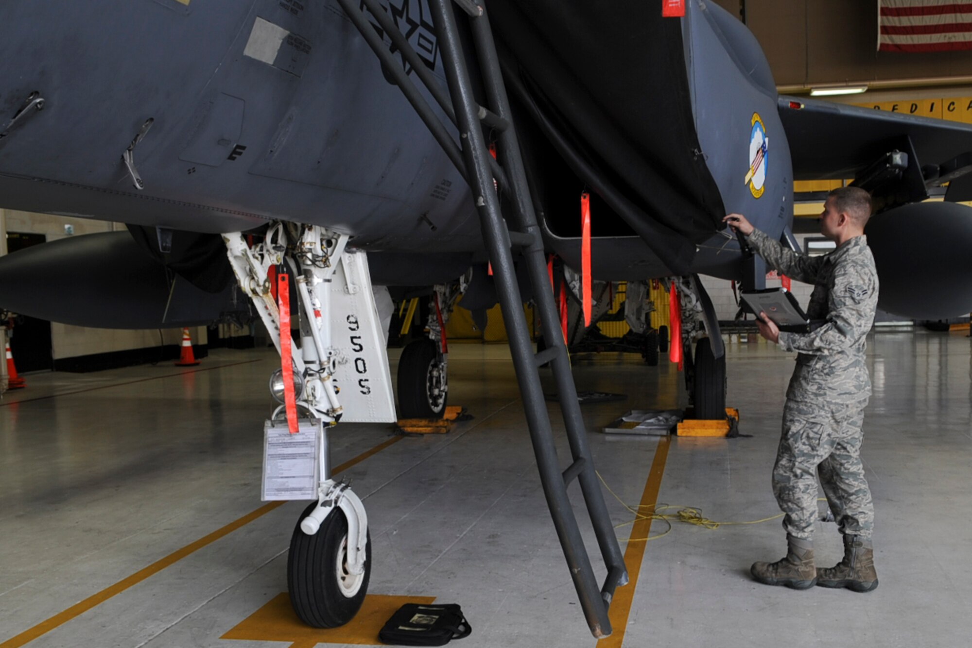 U.S. Air Force Airman 1st Class Thomas Walser inspects an F-15E Strike Eagle in preparation for an April 16 training mission on Seymour Johnson Air Force Base, N.C., April 13, 2012. Maintainers worked 12-hour shifts to ensure nearly 70 F-15E Strike Eagles were mission ready. Walser, 336th Air Maintenance Unit assistant dedicated crew chief, hails from Tamaqua, Pa. (U.S Air Force photo/Airman 1st Class Aubrey Robinson/Released)