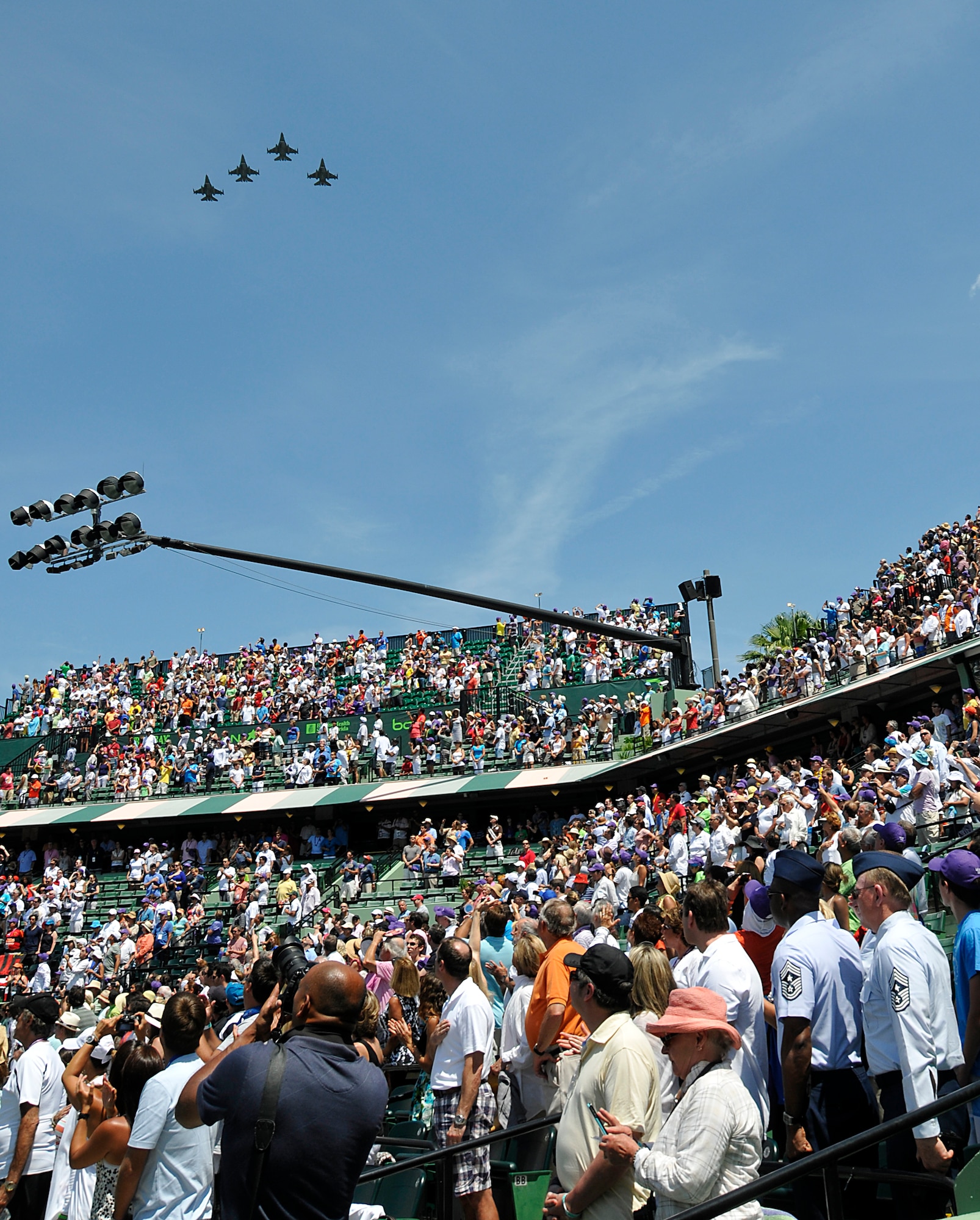 Four F-16's from the Homestead Air Reserve Base 93rd Fighter Squadron provide a well timed flyover for the Sony Ericsson Open Tennis Tournament  Men's Final, Apr. 1. 