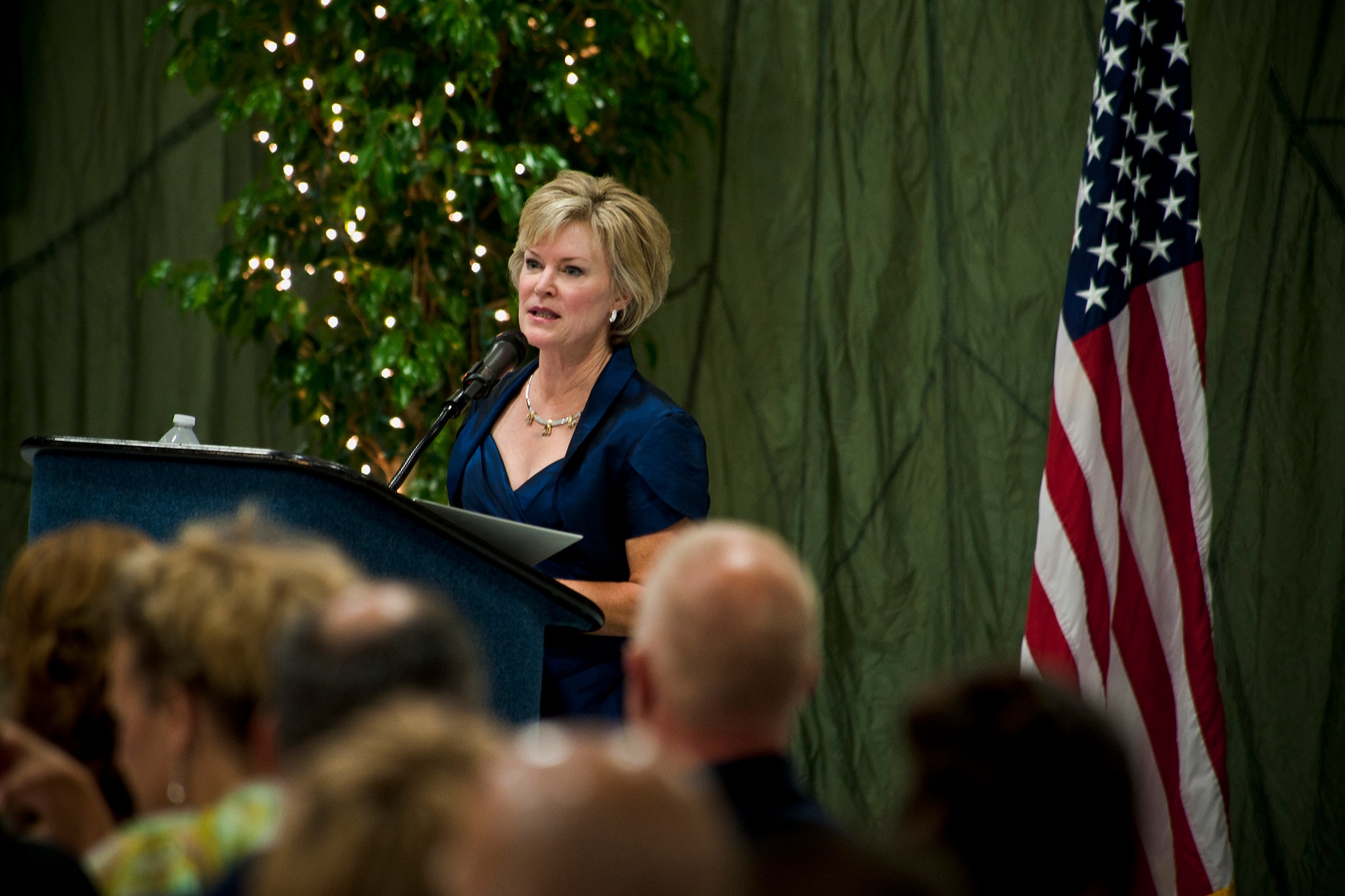 Dawn Goldfein, wife of U.S. Air Force Lt. Gen. David Goldfein, commander, Air Force Central Command, gives remarks during the 347th Rescue Group Rescue Warrior Ball at Moody Air Force Base, Ga., April 13, 2012. From a spouse’s perspective, Goldfein shared the story of when enemy forces shot down her husband’s aircraft while conducting a mission during Operation Allied Force in Serbia, May 2, 1999. Then a lieutenant colonel, Goldfein was brought back home safely by rescue warriors. (U.S. Air Force photo by Staff Sgt. Jamal D. Sutter/Released) 