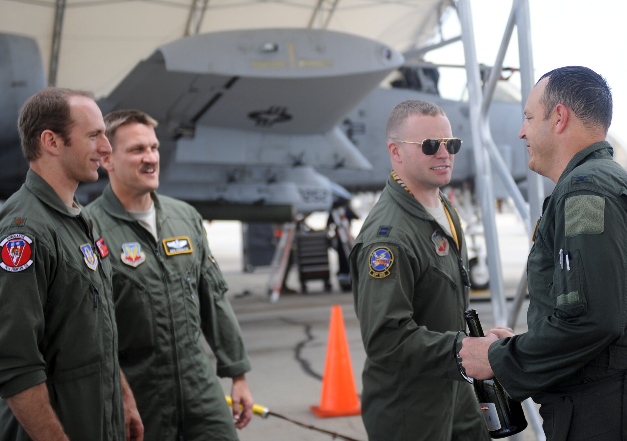 Moody Airmen shake hands with U.S. Air Force Col. Christopher Short, 23d Wing vice commander, after returning from his final flight at Moody Air Force Base, Ga., April 13, 2012. The flight was Short’s final flight before departing for Mountain Home Air Force Base, Idaho. (U.S. Air Force photo by Airman 1st Class Douglas Ellis/Released)
