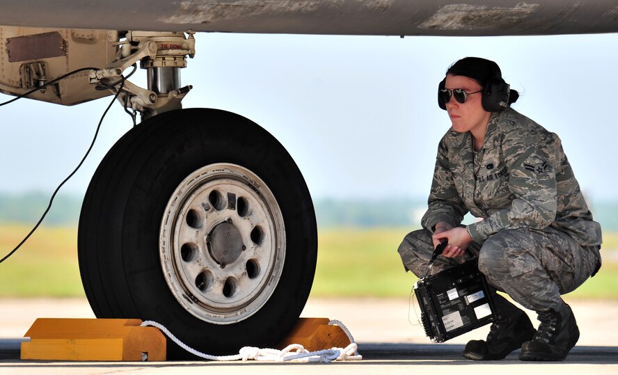 U.S. Air Force Airman 1st Class Amanda Kobel waits to perform a pre-flight inspection on an F-15E Strike Eagle during a “Turkey Shoot” training mission on Seymour Johnson Air Force Base, N.C., April 16, 2012. The wing generated nearly 70 aircraft to destroy more than 1,000 targets on bombing ranges across the state to commemorate the 4th’s victory over the Luftwaffe on April 16, 1945. (U.S. Air Force photo/Staff Sgt. Makenzie Lang/Released)
