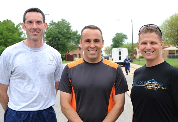 Top finishers in the men’s division of the “Well and Aware” 5K-run and one-mile walk April 10 at the Fitness Center, Vance Air Force Base, Okla., were, left to right: third place, Chaplain (Capt.) Jon Bravinder, 71st Flying Training Wing Chapel; second place, Lt. Col. Peter Stapleton, the director of operations for the 32nd Flying Training Squadron; and first place, Lt. Col. Thomas Pauly, director of operations for the 71st Operations Support Squadron. (U.S. Air Force photo/ Airman 1st Class Frank John Casciotta)