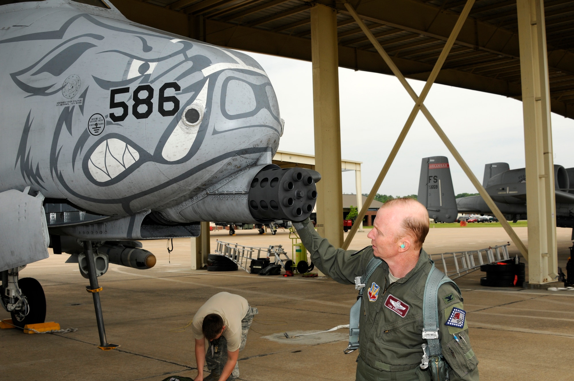 Col. Tom Anderson conducts a preflight inspection on an A-10C Thunderbolt II “Warthog” prior to his “fini flight” at the 188th Fighter Wing April 12, 2012. Anderson’s final flight in the A-10 preceded a change-of-command ceremony in which he relinquished command of the 188th April 14. Anderson served as the 188th Fighter Wing commander from October 2008 until April 14. During his career, Anderson accumulated more than 2,500 flying hours in the A-10, F-16 Fighting Falcon, T-38 and T-37 aircraft. (National Guard photo by Senior Master Sgt. Dennis Brambl/188th Fighter Wing Public Affairs)