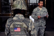 Tech. Sgt. Christopher Diaz, right, 8th Security Forces Squadron response force leader, briefs base defenders before they enter the Wolf Pack Fitness Center, April 16, 2012, during an emergency management exercise.  The 8th Fighter Wing is currently undergoing a Consolidated Unit Inspection by Pacific Air Forces Inspector General team members, who test the base’s ability to respond to crises such as an active shooter.