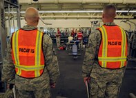 Pacific Air Forces Inspector General team members observe 8th Fighter Wing emergency responders during an active shooter exercise at the Wolf Pack Fitness Center, April 16, 2012. The PACAF IG is currently conducting inspections of the 8th Fighter Wing to evaluate all processes and the Wolf Pack’s ability to react in crises. (U.S. Air Force photo/Senior Airman Jessica Hines) 