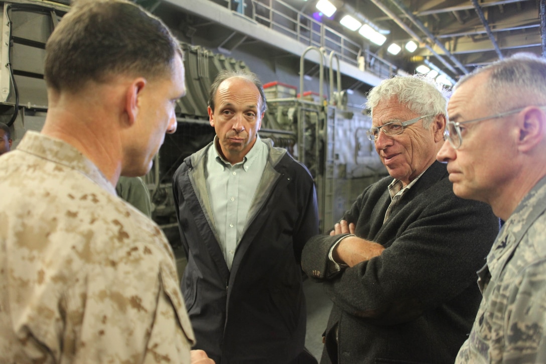 Col. Frank Donovan, far left, the 24th Marine Expeditionary Unit commanding officer, discusses the amphibious capabilities of his MEU to Ambassador Sam Kaplan, the U.S. ambassador to the Kingdom of Morocco, during a visit aboard the ship here, April 16, 2012, in the final days of Exercise African Lion 12. African Lion is a bi-lateral training exercise between U.S. forces, including the 24th MEU, and Royal Moroccan Armed Forces to promote partnership and mutual understanding between each nation’s militaries. The 24th MEU, along with the Iwo Jima Amphibious Ready Group, is currently deployed as a theater security and crisis response force capable of a variety of missions from full-scale combat to humanitarian assistance and disaster relief.