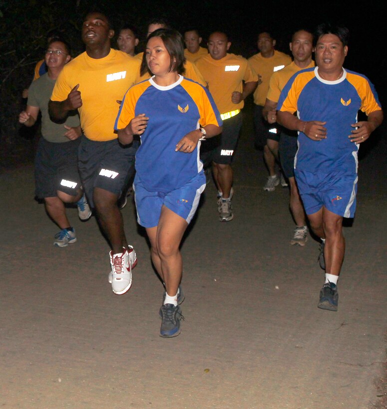 Philippine Airmen from 5717 Communication Squadron and U.S. sailors from Marine Wing Support Group 17 run together during Exercise Balikatan 2012 (BK12) April 17, 2012 at the Antonio Bautista Air Base in Puerto Princesa, Palawan, Republic of the Philippines. BK12, in its 28th iteration, is an annual bilateral training exercise between the Republic of the Philippines and U.S. military members designed to build joint planning, contingency, humanitarian and disaster relief capabilities. The 5717 Communication Squadron is part of the Philippine Air Force. MWSG-17 is part of 1st Marine Aircraft Wing, III Marine Expeditionary Force.