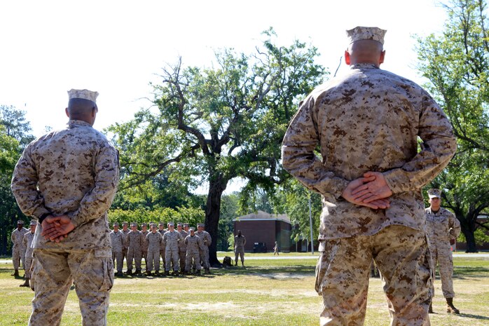 Sergeants Major Phillip A. Orellano (left) and Roger F. Griffith, the outgoing and incoming senior enlisted advisors, respectively, for Combat Logistics Battalion 6, 2nd Marine Logistics Group, stand in front of a formation during a relief and appointment ceremony aboard Camp Lejeune, N.C., April 17, 2012.  Griffith arrived from 2nd Marine Special Operations Battalion, U.S. Marine Corps Forces Special Operations Command. (U.S. Marine Corps photo by Cpl. Katherine M. Solano)