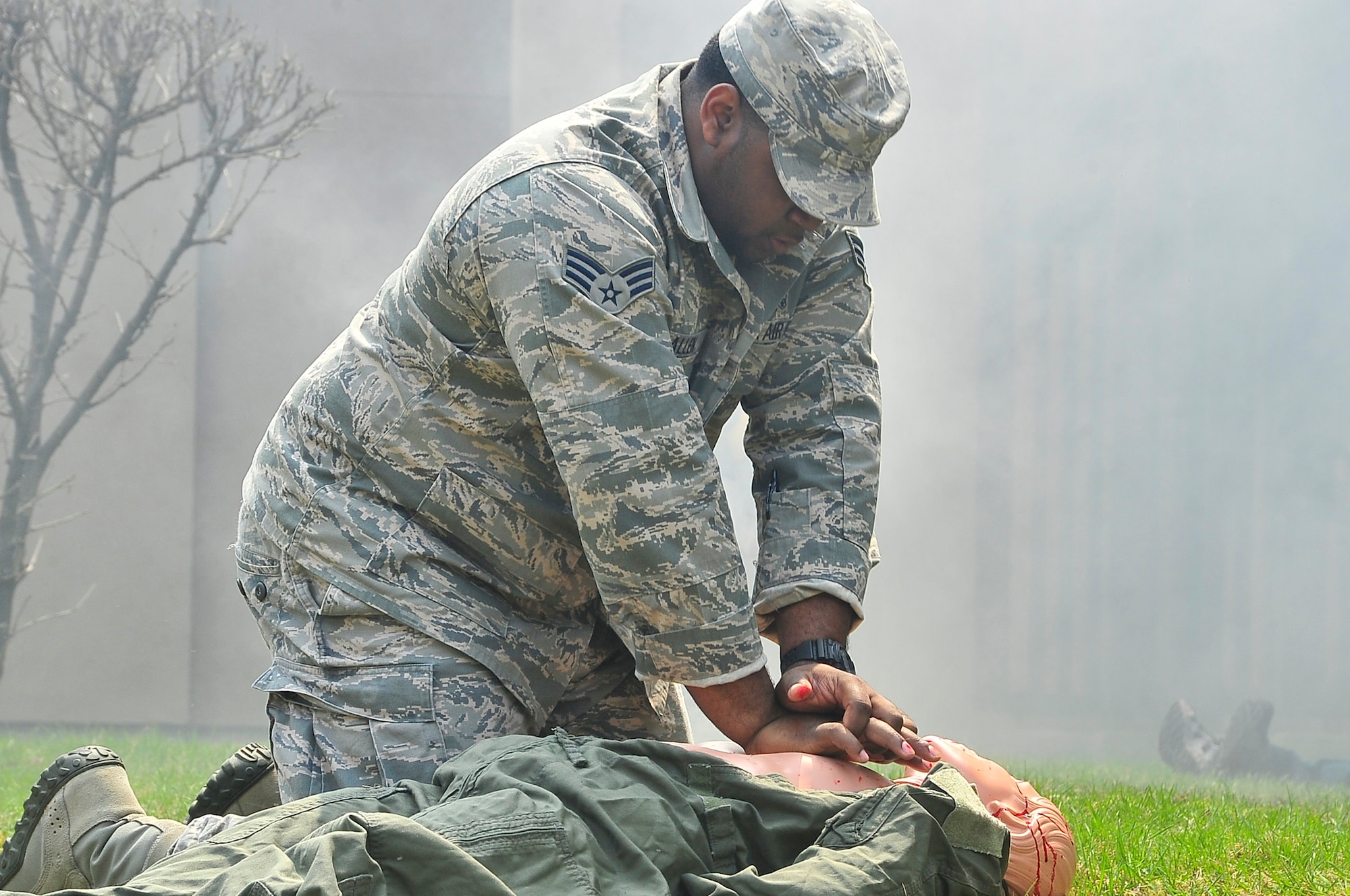 Senior Airman Timothy Allen, 51st Medical Operations Squadron medical technician, performs CPR on a mannequin during an Emergency Management Inspection here, April 16, 2012. The EMI tested how well Osan’s responders react and how the evaluators tested that ability. Evaluators were tested on a few major areas by the Pacific Air Forces Inspector General Team, which included response, withdrawal and recovery. (U.S. Air Force photos/Senior Airman Adam Grant)