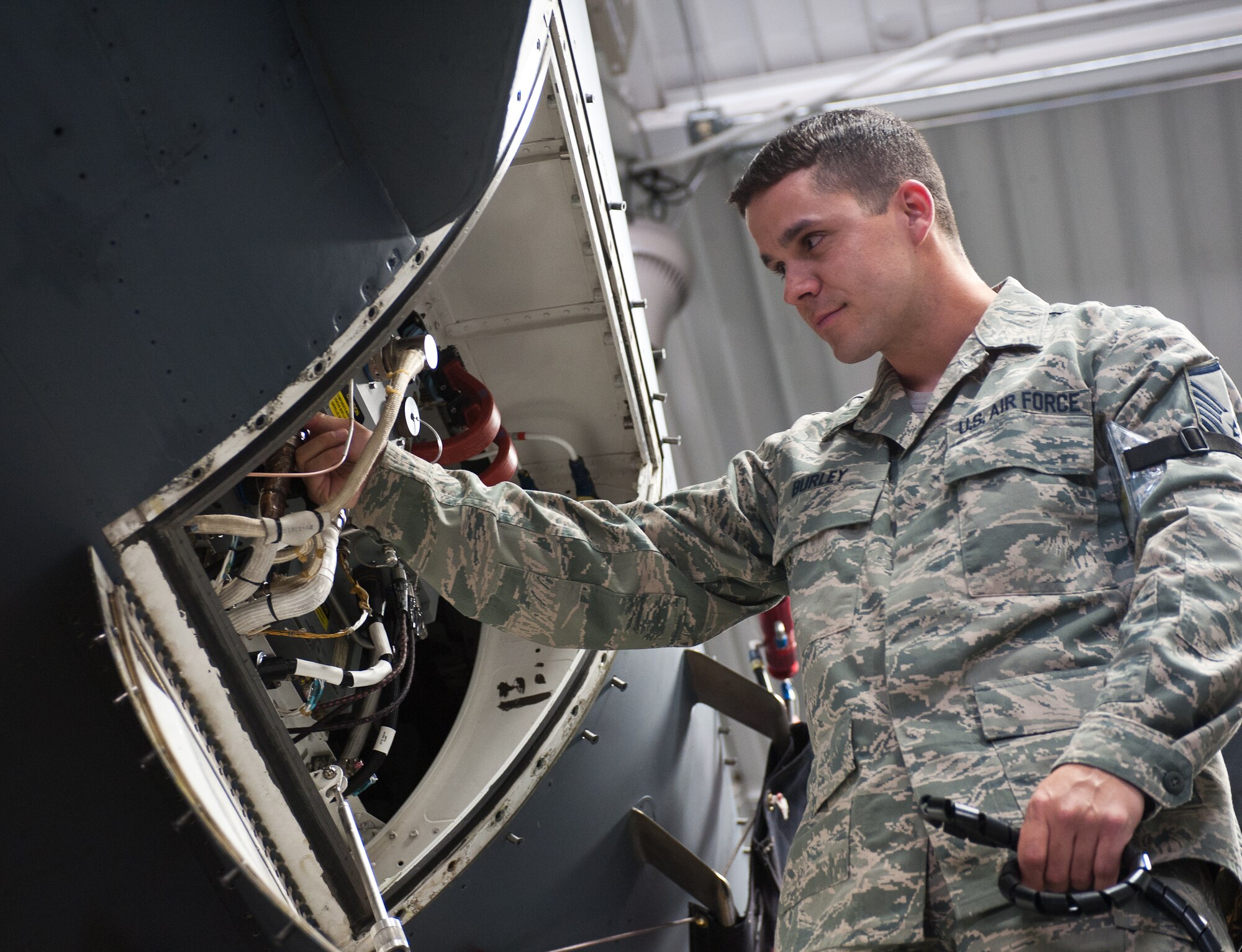 Master Sgt. Richard Burley, 28th Maintenance Group wing avionics manager, performs a quality control check during an equipment upgrade to a B-1 bomber’s radar system at Ellsworth Air Force Base, S.D., April 11, 2012. These radar system upgrades are done to update electronic systems to newer and lighter versions that save maintenance time while increasing the reliability of the system. (U.S. Air Force photo by Airman 1st Class Alystria Maurer/Released)
