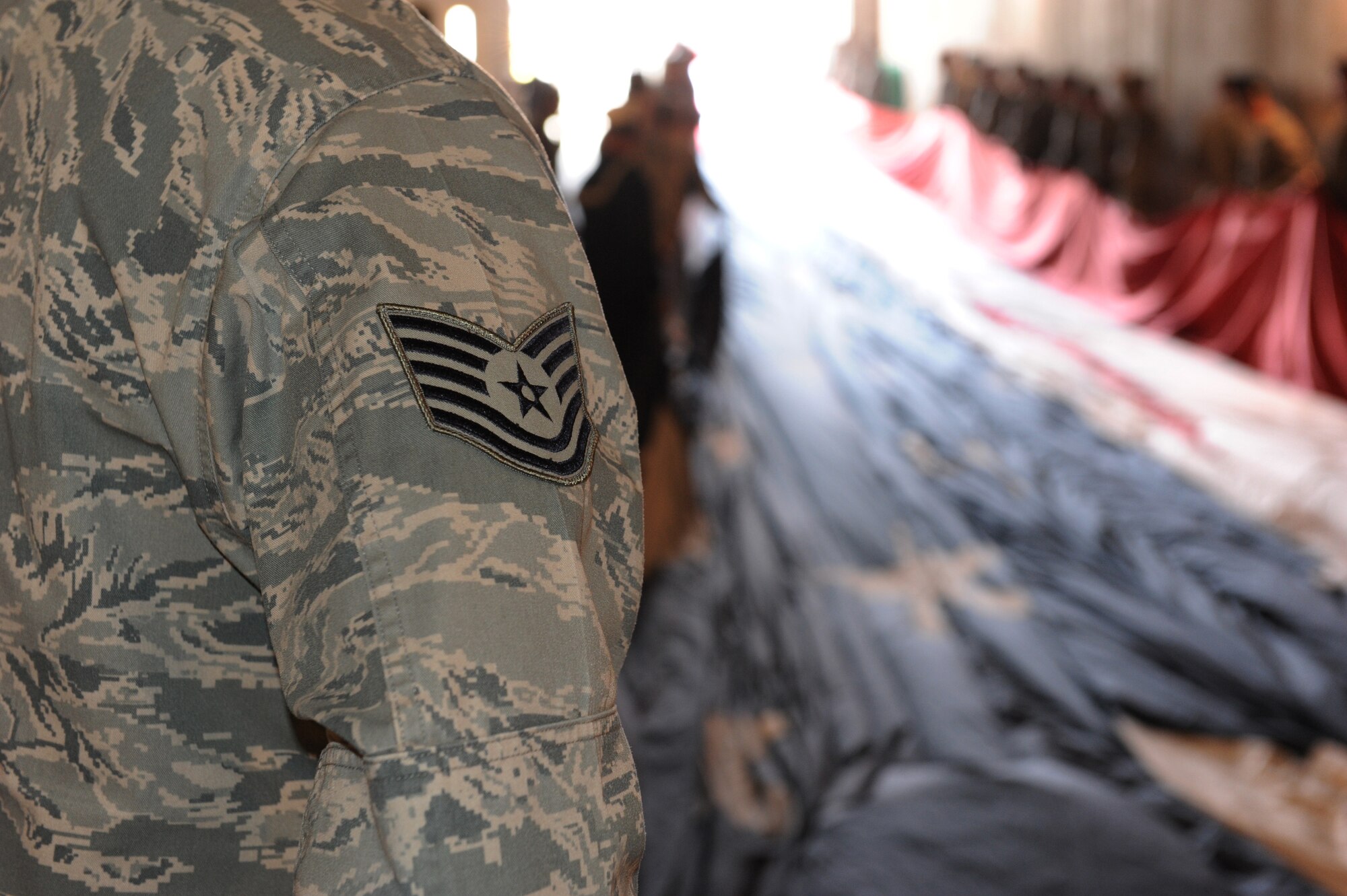 KANSAS CITY, Mo. -- Airmen and Soldiers from Whiteman Air Force Base participate in a flag detail for the Kansas City Royals Opening Day at Kauffman Stadium April 13. The B-2 Spirit was also featured during a fly over and the B-2 flew from Whiteman AFB as part of a training mission. The aircraft was piloted by Lt. Col. Aaron “Pepe” Pepkowitz and Maj. John “Edge” Speer, 394th Combat Training Squadron. The Kansas City Royals lost to the Cleveland Indians, with the final score 8 to 3. (U.S. Air Force Photo/Jennifer Greene)(Released)