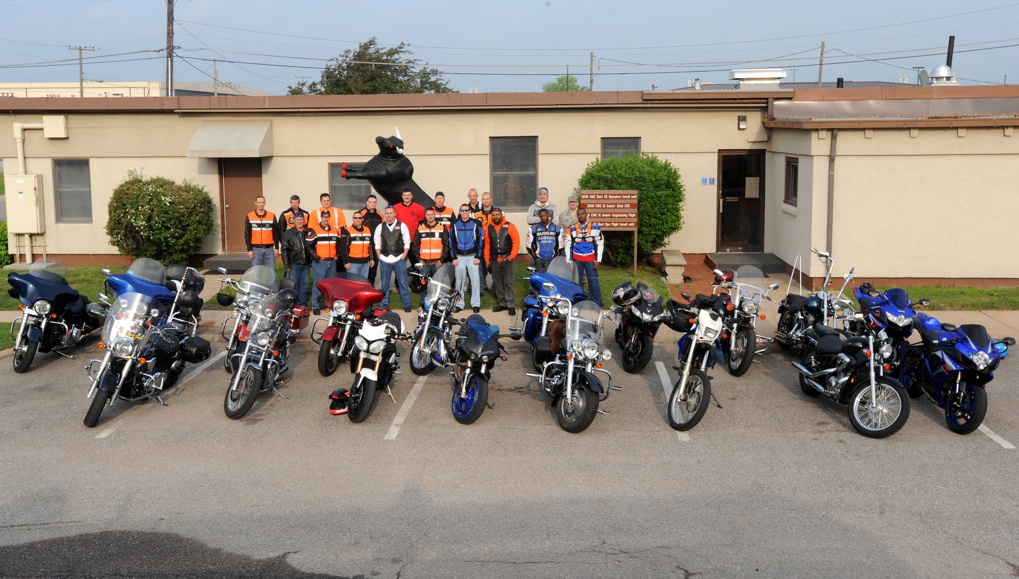 Team McConnell Airmen pose with their motorcycles before a group ride to Marquette, Kan., April 13, 2012, McConnell Air Force Base, Kan. The 22nd Civil Engineer Squadron hosted the ride to promote safe riding habits. (U.S. Air Force photo/ Airman 1st Class Laura L. Valentine)
