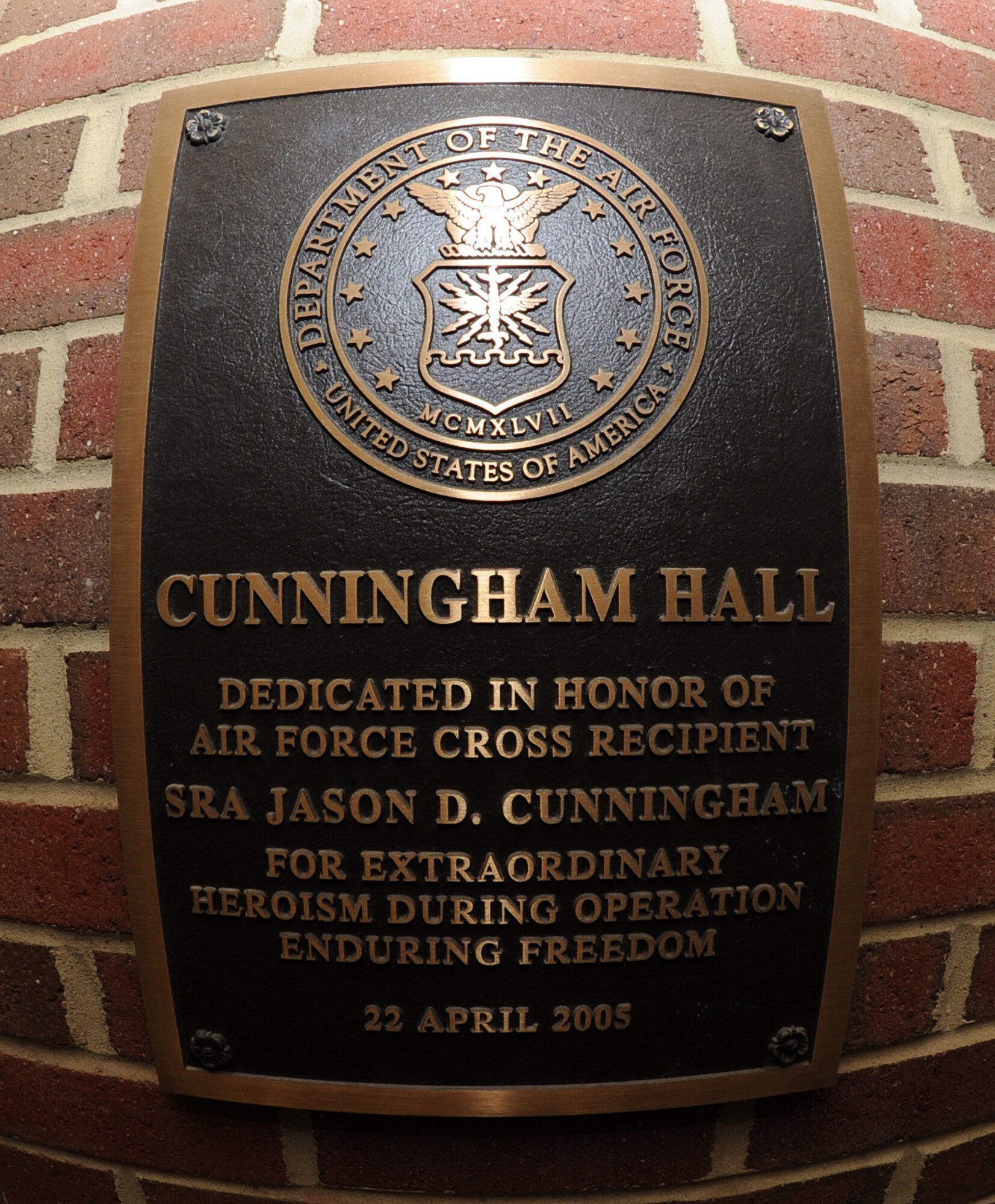 Senior Airman Jason Cunningham, a U.S. Air Force pararesueman, was awarded the Air Force Cross during his first combat mission at the battle of Takur Ghar, located in southeast Afghanistan, March 4, 2002. He died while administering an IV to a wounded aircrew member.  Langley Air Force Base’s dormitories are named after Airmen, like Cunningham, with records of exemplary and honorable service. (U.S. Air Force photo by Airman 1st Class Teresa Cleveland/Released)