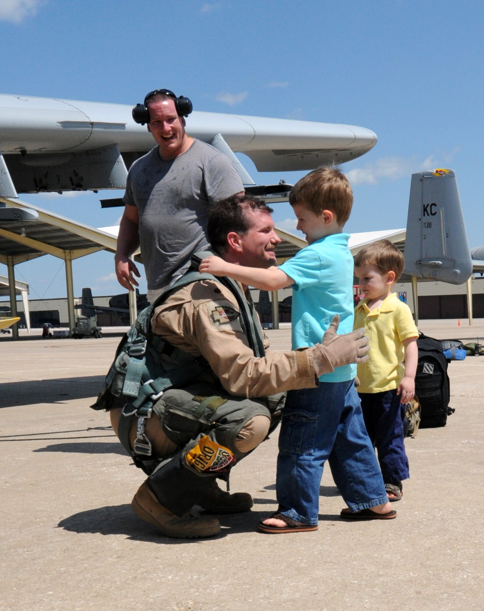 Maj. Brian Leiter, 303rd Fighter Squadron A-10 Thunderbolt II pilot, returns from Afghanistan April 17, 2012, while he hugs his son for the first time. The 303rd FS is part of the 442nd Fighter Wing, an Air Force Reserve unit at Whiteman Air Force Base, Mo. (U.S. Air Force photo/Staff Sgt. Danielle Johnston)