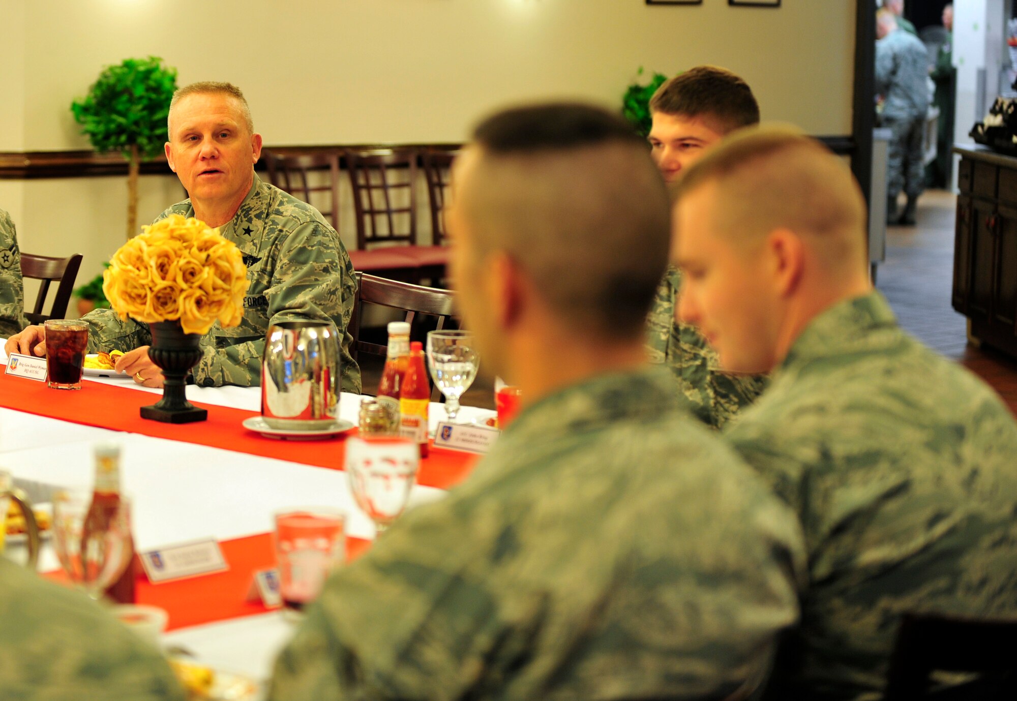 U.S. Air Force Brig. Gen. Daniel Wyman, Air Combat Command surgeon general, has breakfast with Airmen from the 23d Medical Group during his visit to Moody Air Force Base, Ga., April 12, 2012. Wyman provided words of encouragement to the Airmen in attendance and answered any questions they had for him. (U.S. Air Force photo by Staff Sgt. Stephanie Mancha/Released)