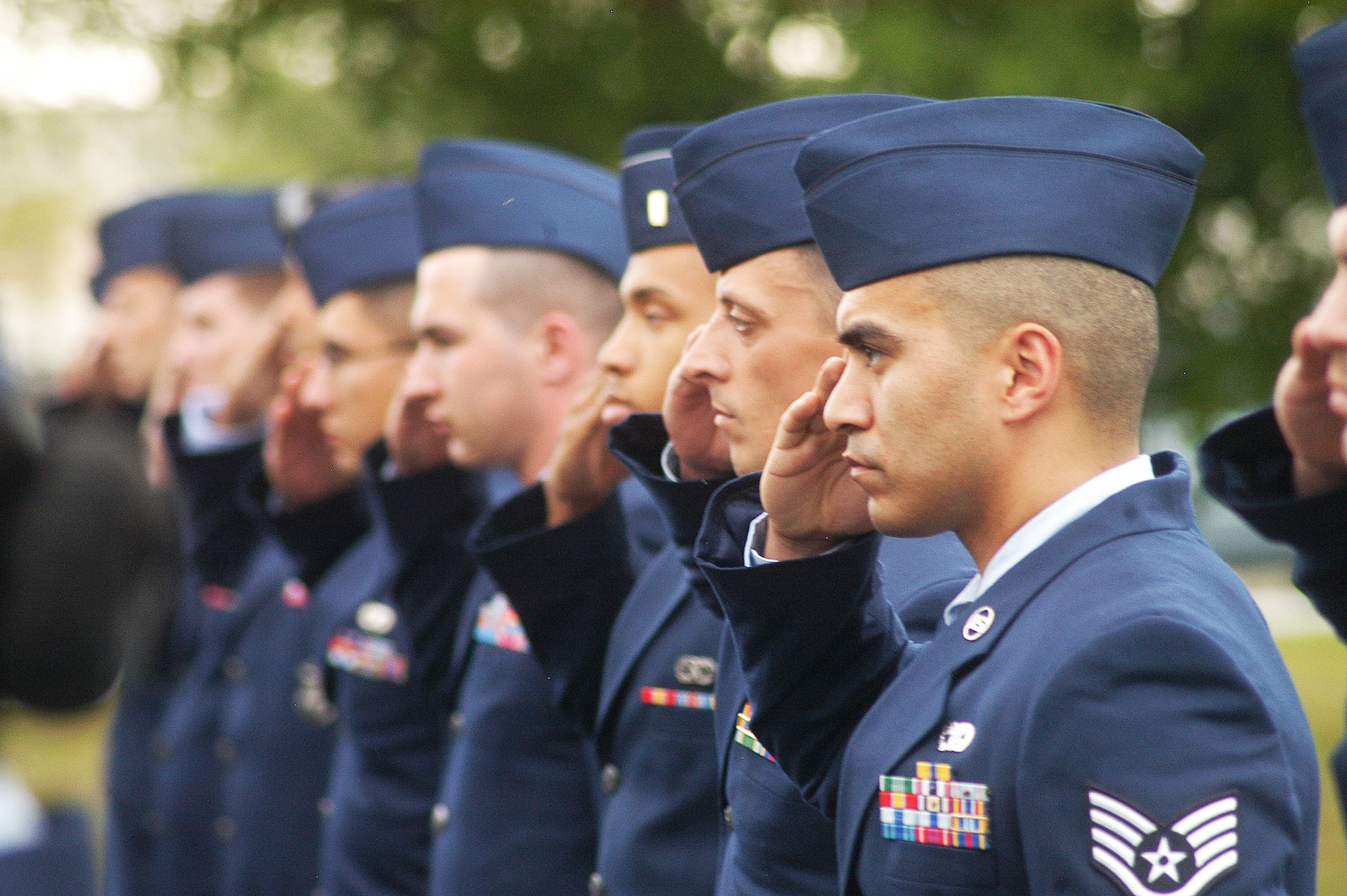 78th Mission Support Group Airmen salute during a retreat ceremony in honor of the retirement of Chief Master Sgt. Eric R. Jaren, Headquarters  Air Force Materiel Command command chief. (U. S. Air Force photo by Sue Sapp)