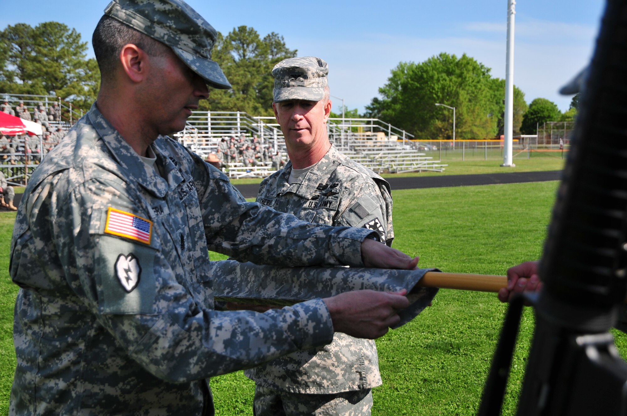 Col. Stephen Cherry, 7th Sustainment Brigade commander (provisional), cases the provisional colors during a Transfer of Authority ceremony at Fort Eustis’ Murphy Field April 13. Cherry, the departing commander, will assume new roles and responsibilities at the Combined Arms Sustainment Center of Excellence at Fort Lee, Va. (U.S. Army photo by Sgt. Edwin Rodriguez/Released)