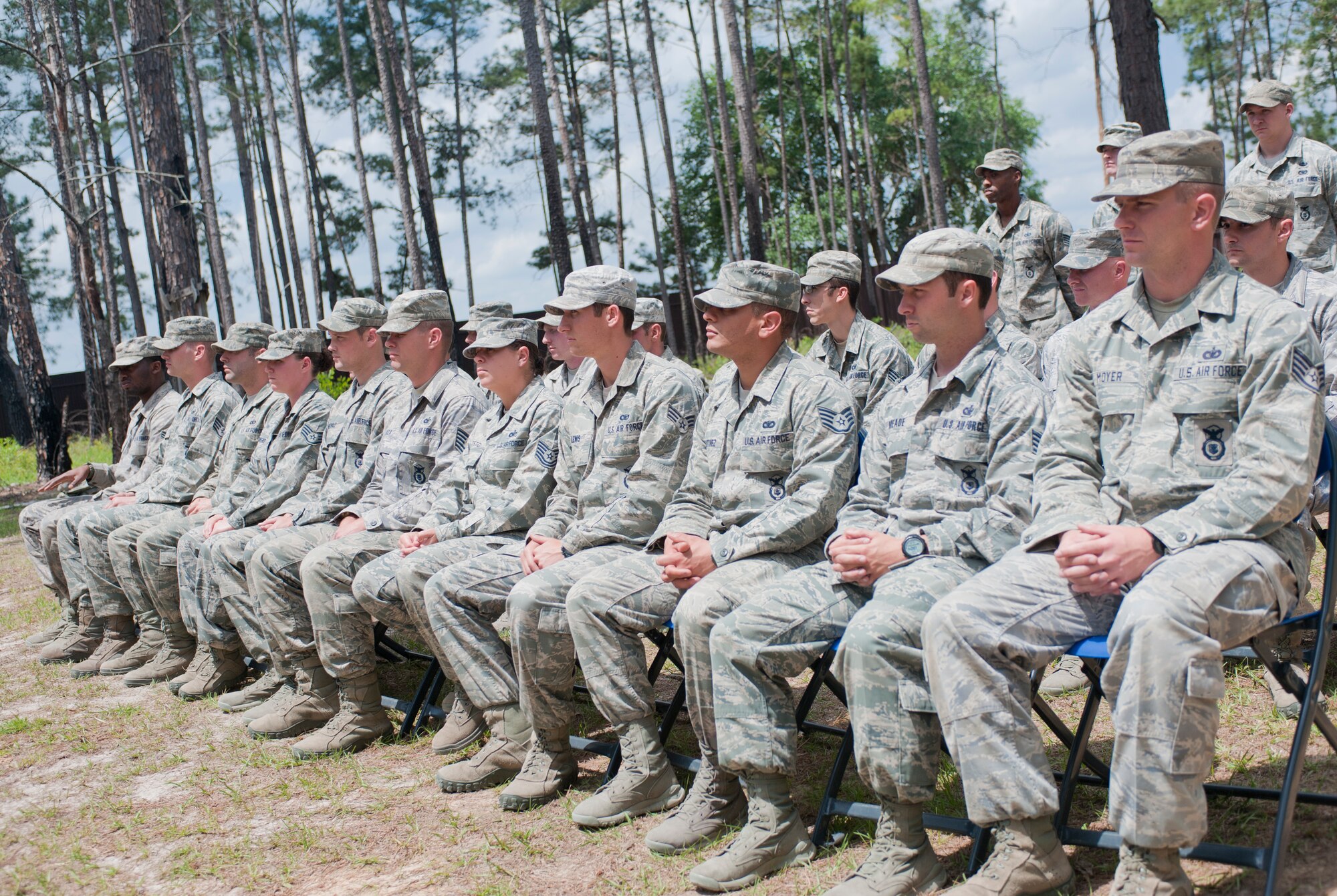 Class 12-2 graduates of the Tactical Leader’s Course listen at Moody Air Force Base, Ga., April 13, 2012 as U.S. Air Force Col. Randall Richert, 820th Base Defense Group commander, gives a speech about the course and the role of 820th BDG Airmen downrange.  The 223-hour course spans three weeks and teaches leadership skills to senior airmen and NCOs. (U.S. Air Force photo by Airman 1st Class Jarrod Grammel/Released)
