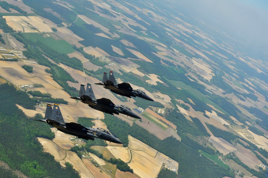 U.S. Air Force F-15E Strike Eagles from the 4th Fighter Wing fly in formation during a Turkey Shoot training mission near Seymour Johnson Air Force Base, N.C., April 16, 2012.  The wing generated nearly 70 aircraft to destroy more than 1,000 targets on bombing ranges across the state to commemorate the 4th Fighter Wing's victory over the Luftwaffe on April 16, 1945.  (U.S. Air Force Photo by Staff Sgt. Eric Harris/Released)