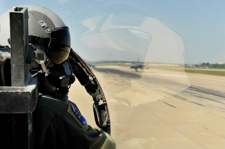 U.S. Air Force Maj. Joe Elam, 4th Operations Support Squadron, prepares for takeoff aboard a F-15E Strike Eagle during a Turkey Shoot training mission on Seymour Johnson Air Force Base, N.C., April 16, 2012.  The wing generated nearly 70 aircraft to destroy more than 1,000 targets on bombing ranges across the state to commemorate the 4th Fighter Wing's victory over the Luftwaffe on April 16, 1945.  (U.S. Air Force Photo by Staff Sgt. Eric Harris/Released)