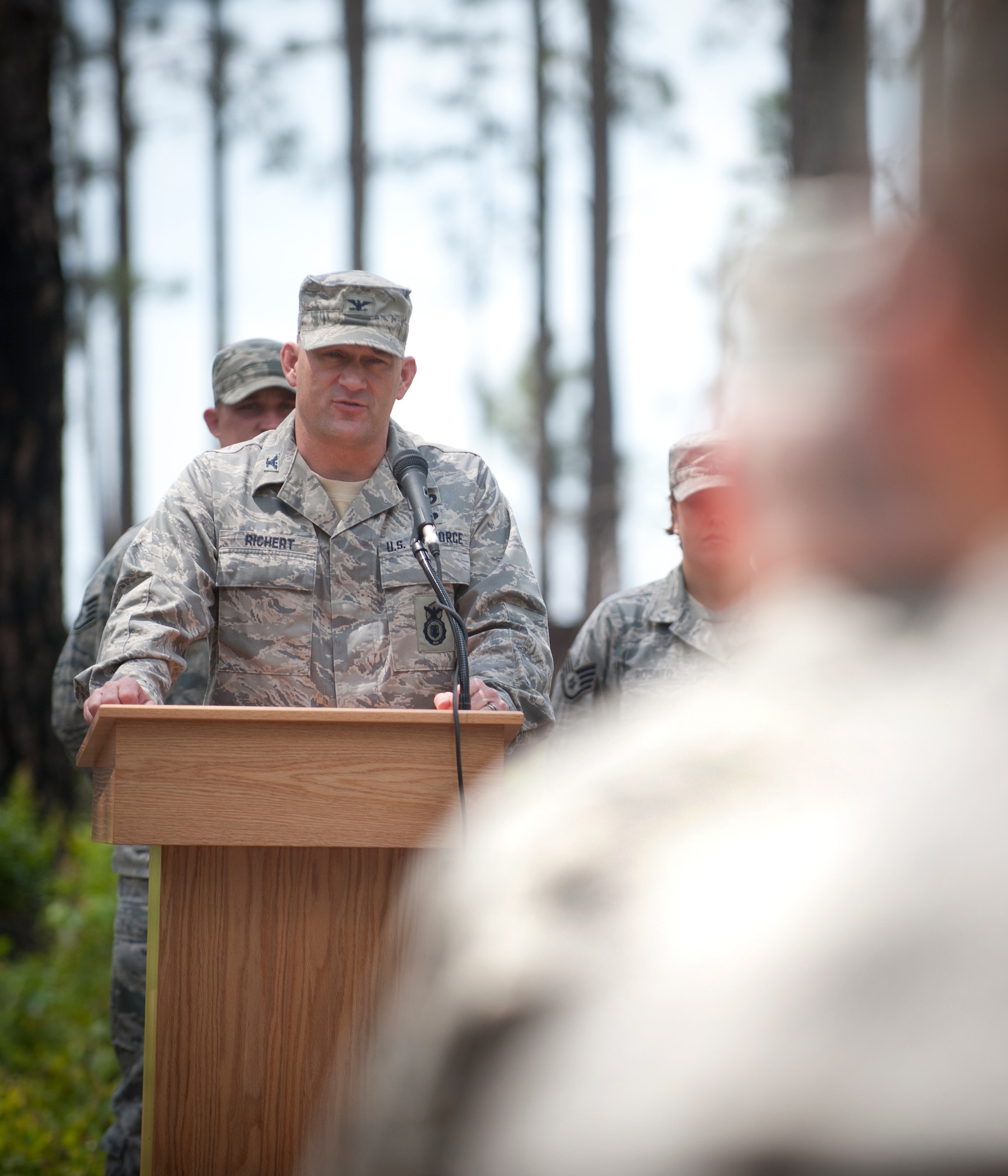 U.S. Air Force Col. Randall Richert, 820th Base Defense Group commander, gives a speech before the graduation ceremony for the Tactical Leader’s Course class 12-2 at Moody Air Force Base, Ga., April 13, 2012. Richert spoke about the evolution of the course and the importance of good leadership. (U.S. Air Force photo by Airman 1st Class Jarrod Grammel/Released)
