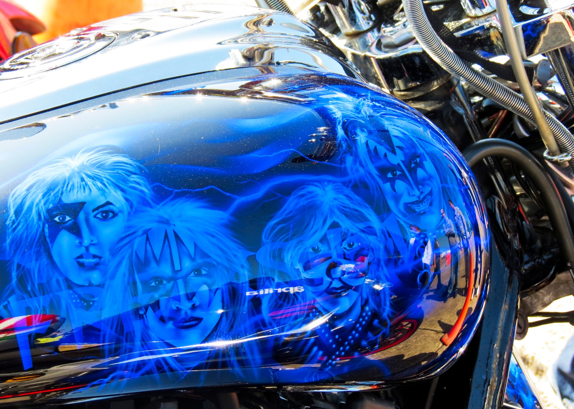 A custom-painted rock-n-roll bike sits on the flightline in front of the climatic lab April 13 at Eglin’s annual motorcycle safety rally.  The rally brought together a record number of 650 bikers from all services and bases for safety discussions, riding courses and group rides.  (U.S. Air Force photo/Irene Freiberg)
